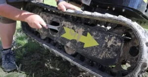 what happens if you over tighten excavator tracks