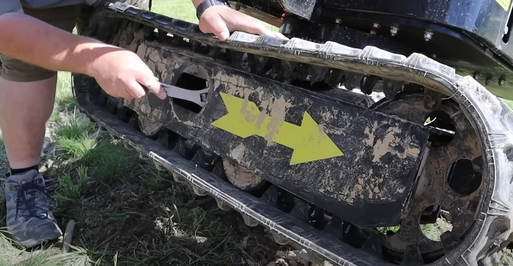 what happens if you over tighten excavator tracks