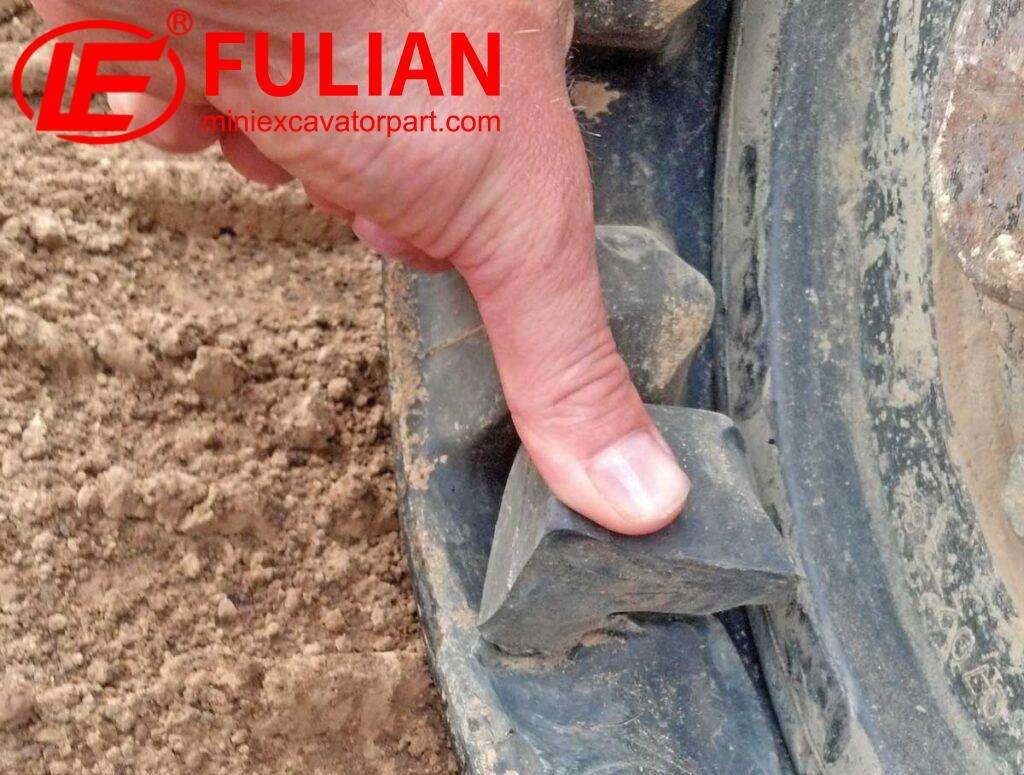how to inspect rubber tracks and detect early cracks, cuts, and embedded debris before major damage occurs