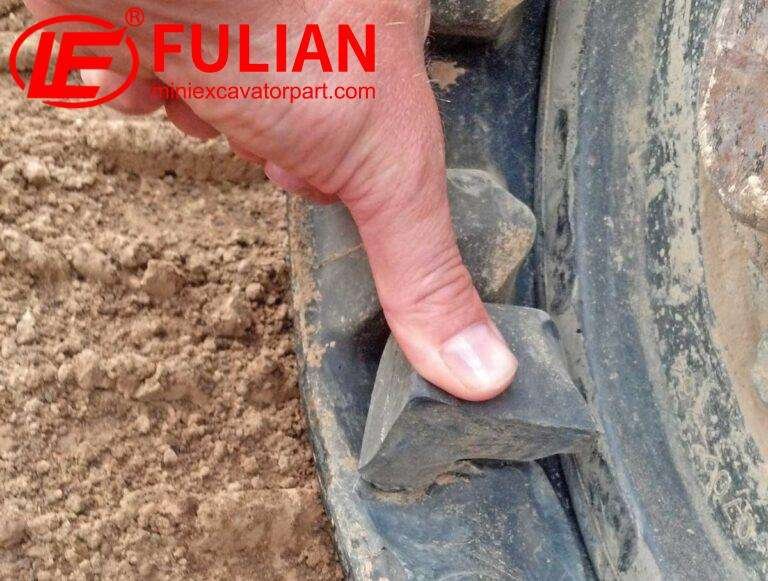 how to inspect rubber tracks and detect early cracks, cuts, and embedded debris before major damage occurs