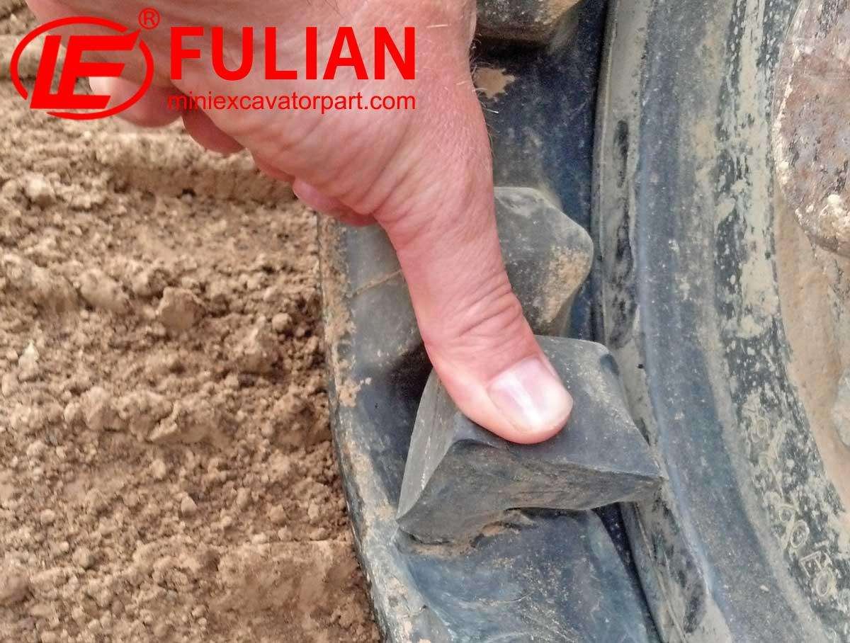 how to inspect rubber tracks and detect early cracks, cuts, and embedded debris before major damage occurs